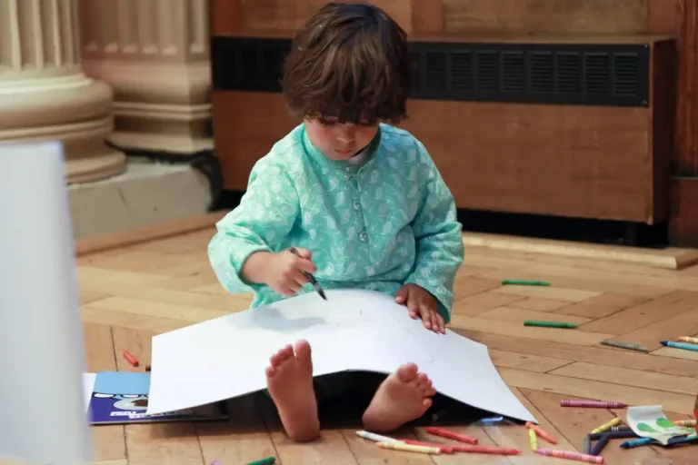 Child drawing at wedding reception