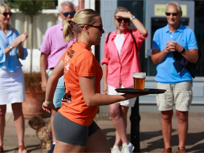 waitress race girl with beer event photograph