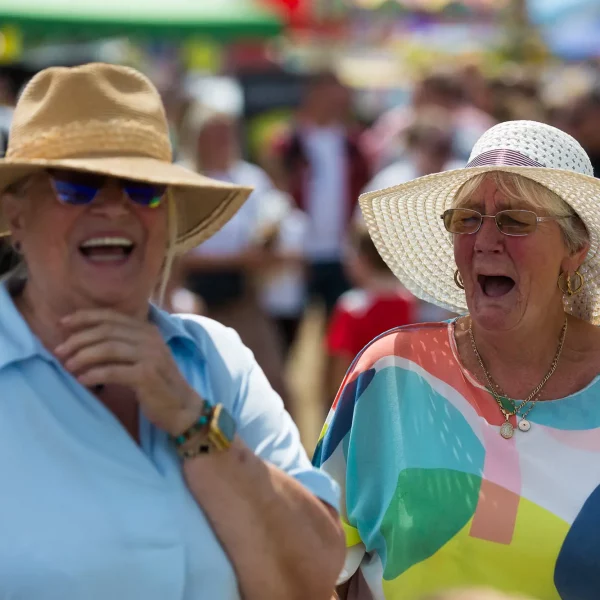 natural event photography of ladies laughing