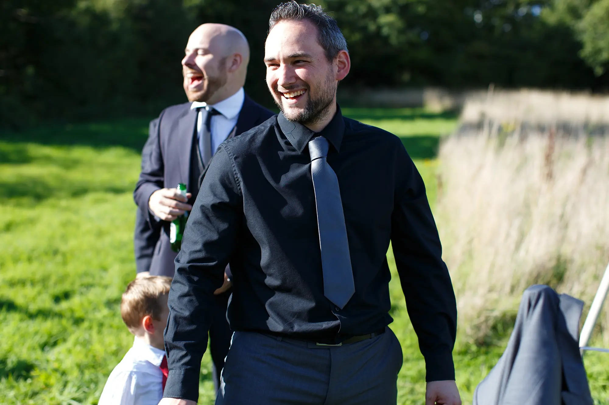 Candid wedding guests outdoors