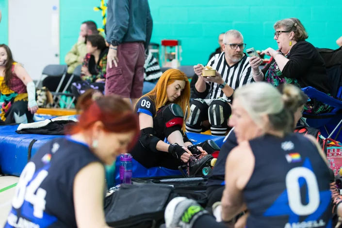 essex roller derby team bench candid