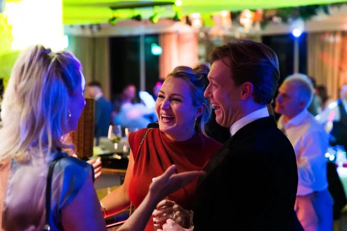 essex wedding reception guests chatting at roslin hotel
