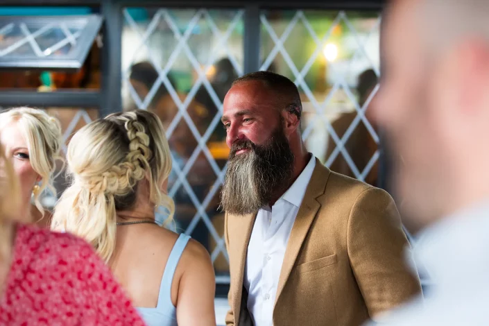 groom guest portrait wedding reception