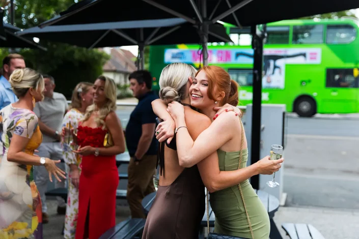 leigh on sea wedding reception guests hugging