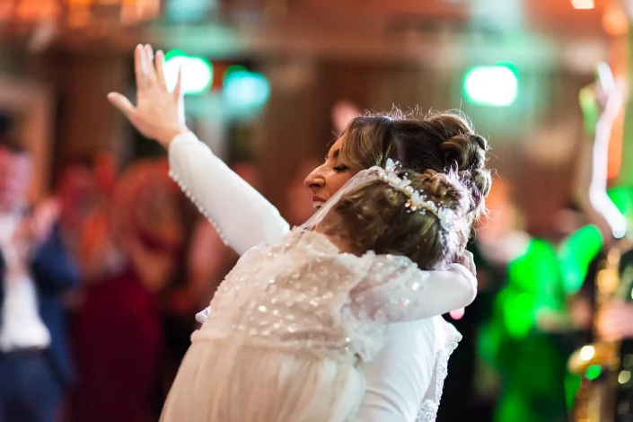 wedding bride hugging on dance floor essex