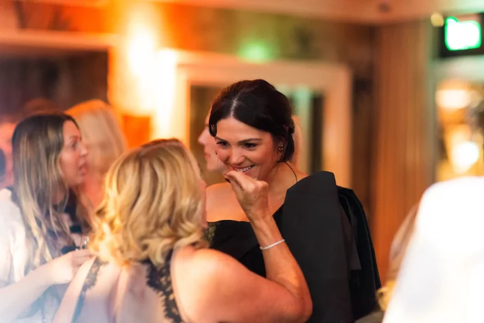 wedding guest laughing at roslin hotel reception