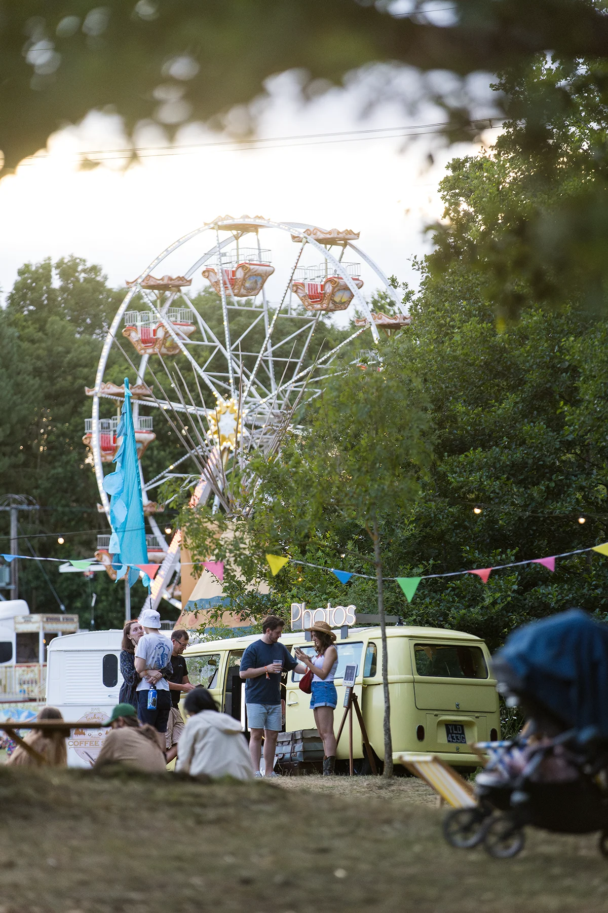 Ferris wheel and guests at an outdoor corporate festival in Essex